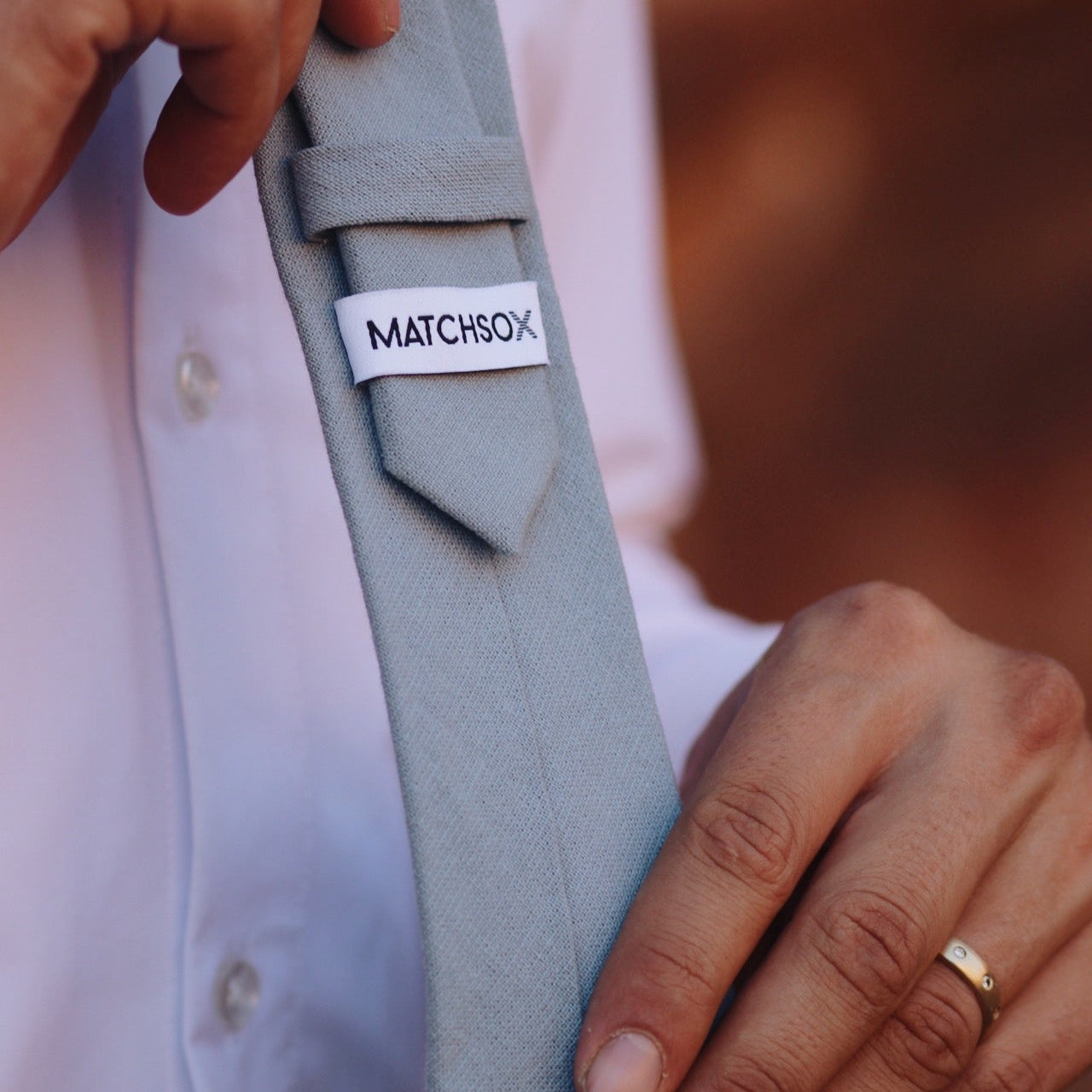 Blue tie with a matchsox label
