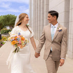 wedding photo with groom in blue floral tie